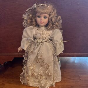 Elegant Porcelain Doll with Lace Dress